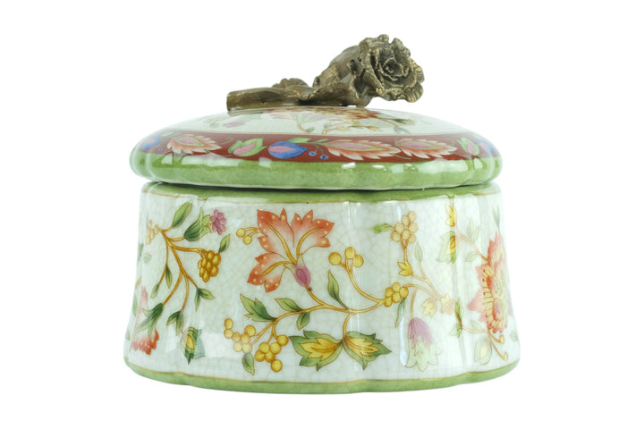 Porcelain box with floral decoration and a bronze rose on the lid