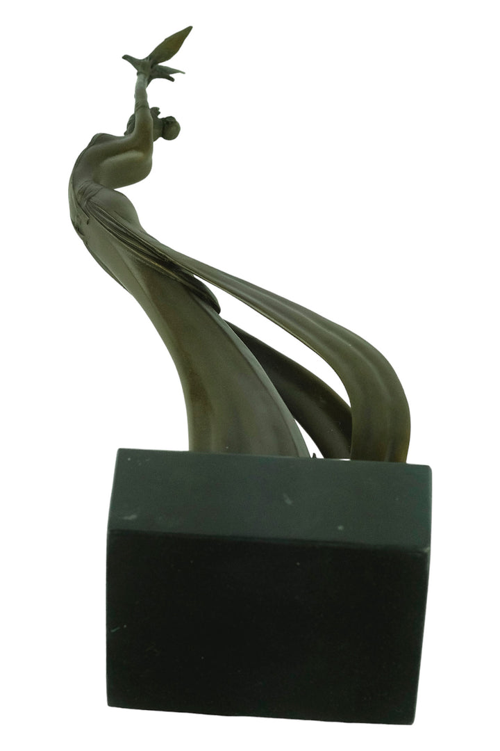 Modern bronze sculpture of a female releasing a bird