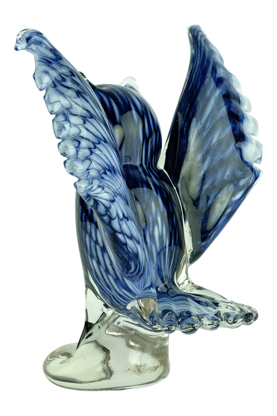Colourful glass sculpture of an owl with wings spread