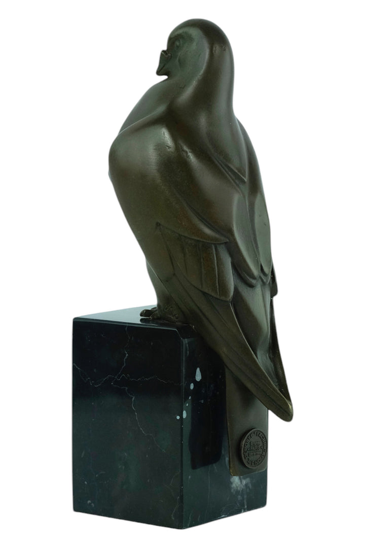 Bronze sculpture of a sitting pigeon in Art Deco style