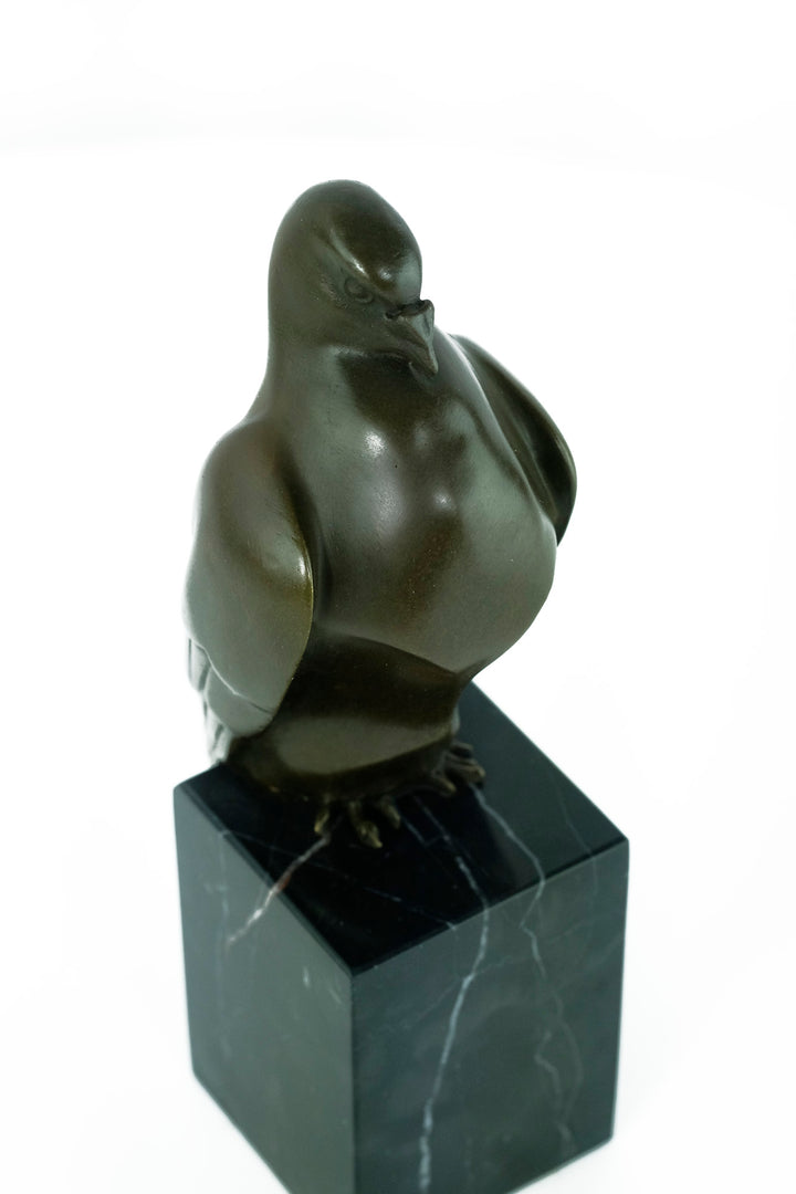 Bronze sculpture of a sitting pigeon in Art Deco style