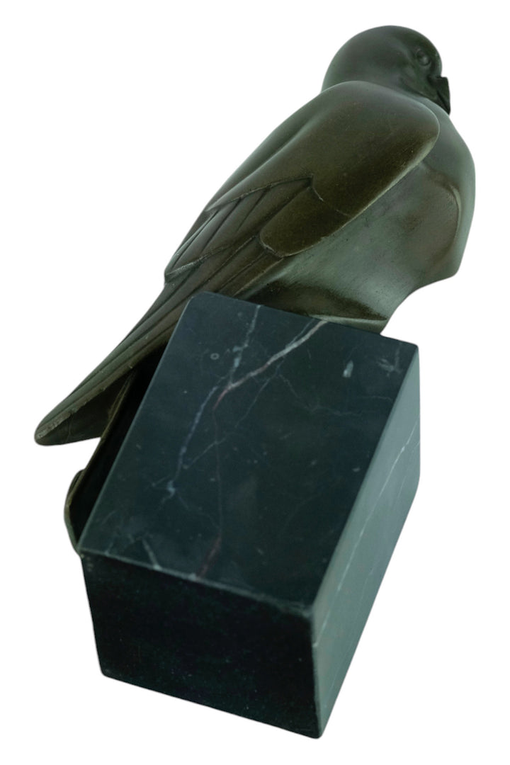 Bronze sculpture of a sitting pigeon in Art Deco style