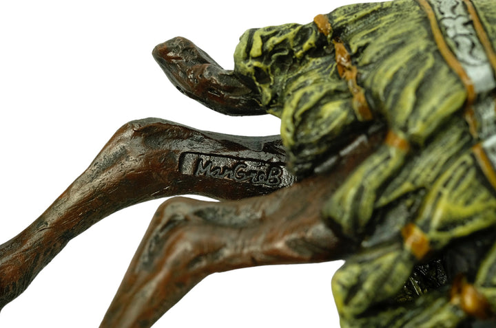 Bronze sculpture of a soldier on a camel
