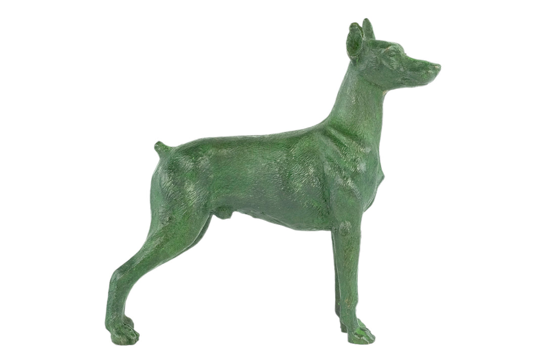 Bronze sculpture of a standing dobermann dog