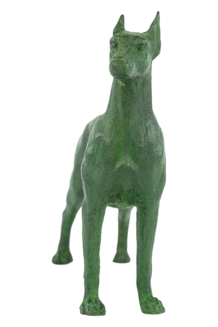 Bronze sculpture of a standing dobermann dog