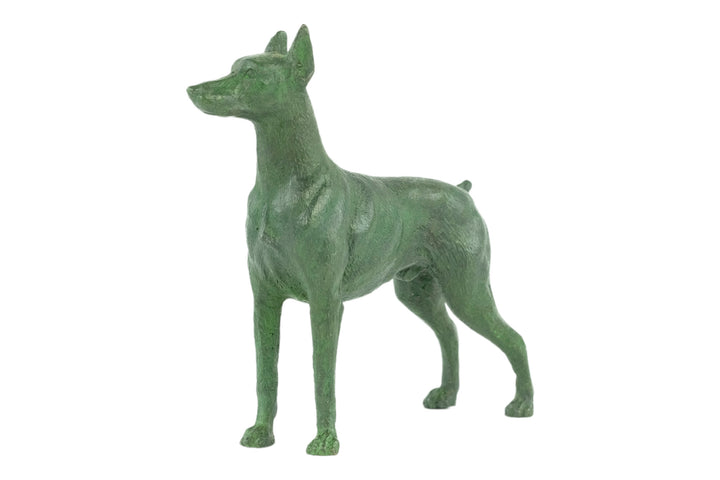 Bronze sculpture of a standing dobermann dog