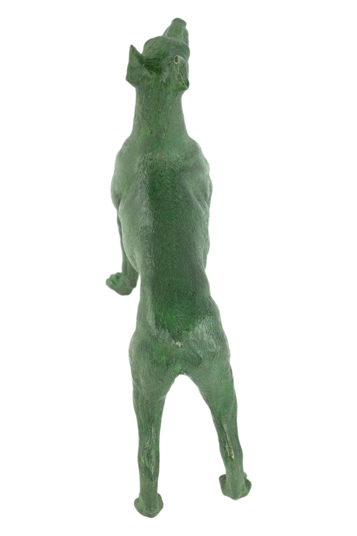 Bronze sculpture of a standing dobermann dog