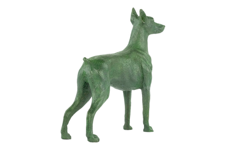 Bronze sculpture of a standing dobermann dog