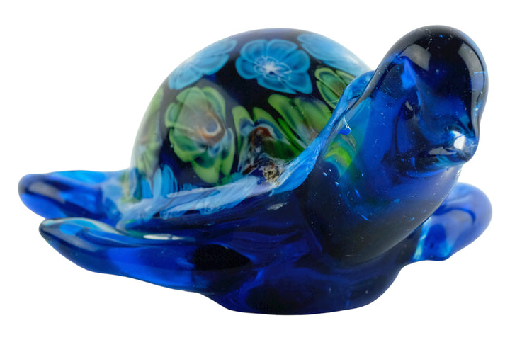 Colorful glass sculpture of a swimming turtle in Murano style, handmade decorative art piece.