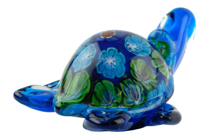 Colorful glass sculpture of a swimming turtle in Murano style, handmade decorative art figure.