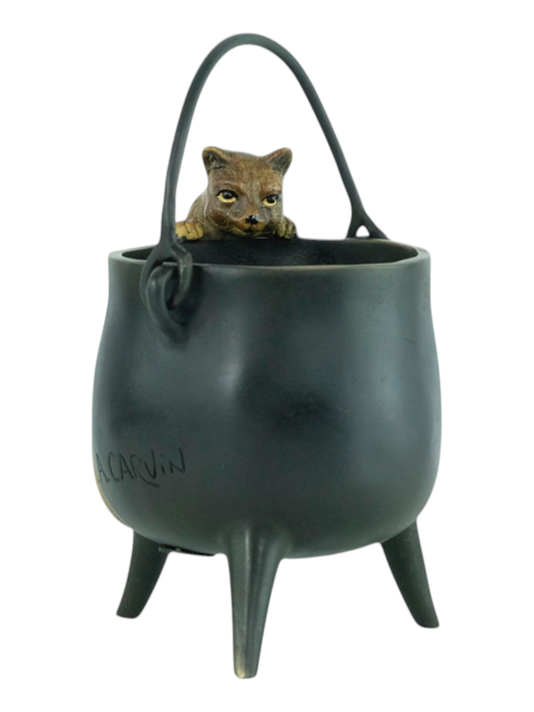 Bronze sculpture of a curious cat climbing into a cauldron