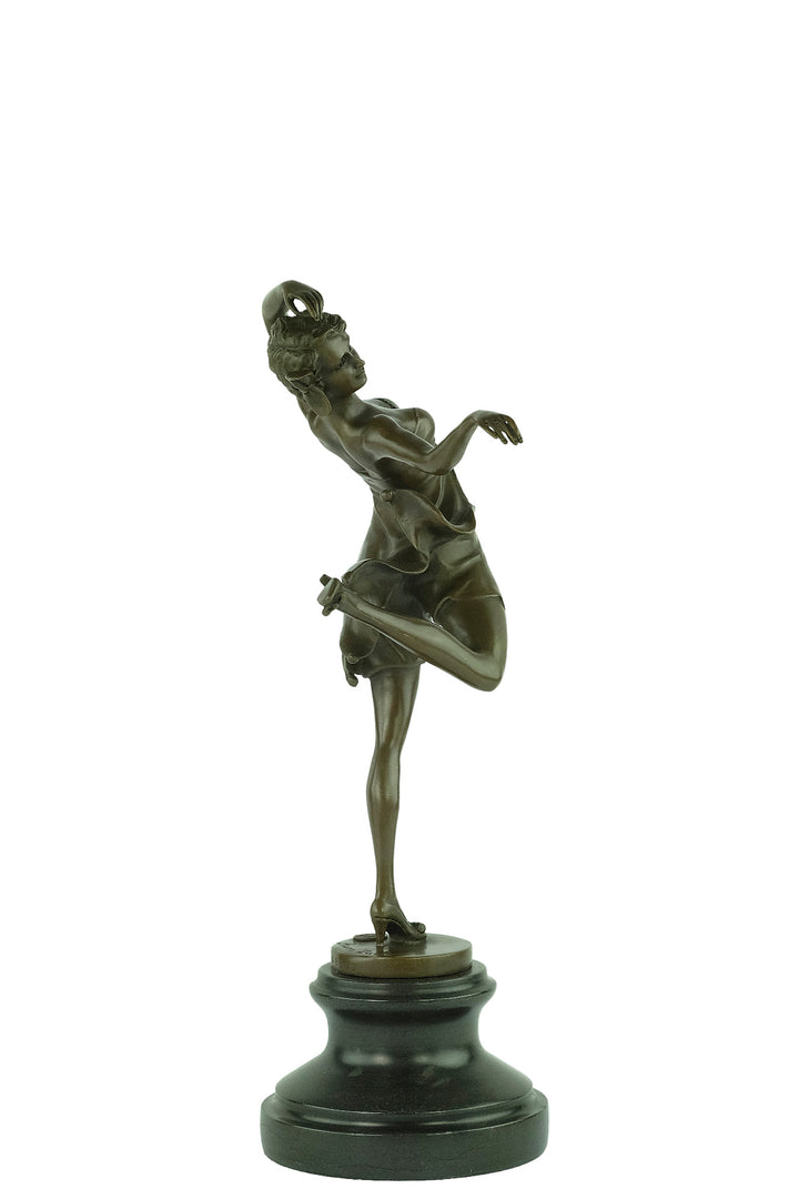 Bronze sculpture of a female dancer in a flowy dress