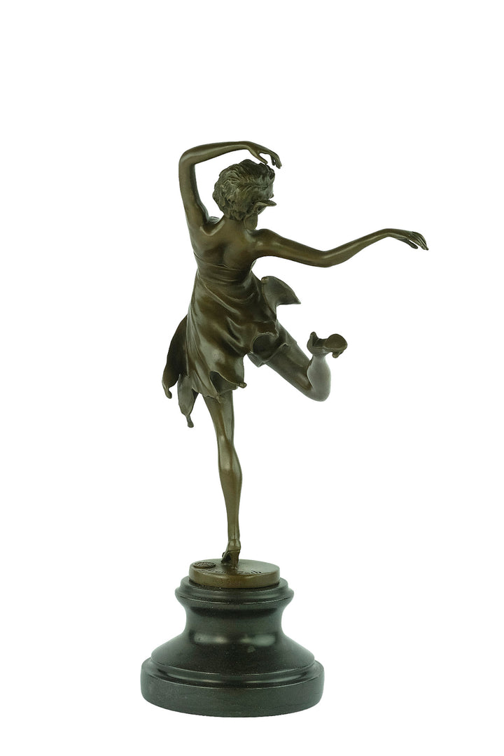 Bronze sculpture of a female dancer in a flowy dress