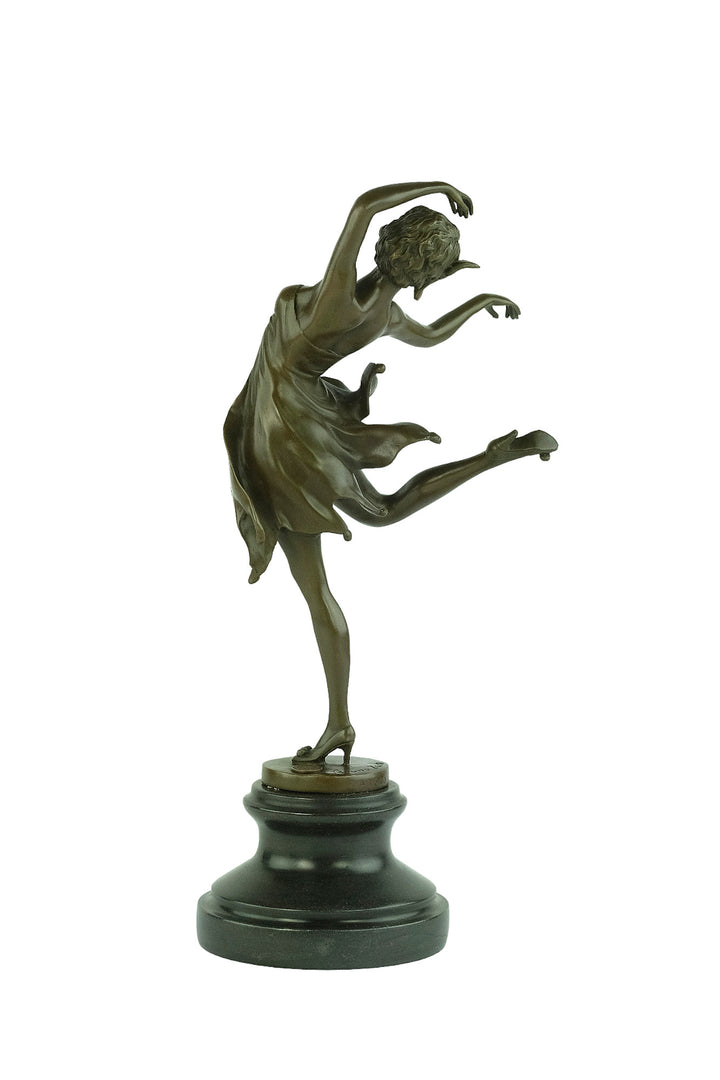 Bronze sculpture of a female dancer in a flowy dress
