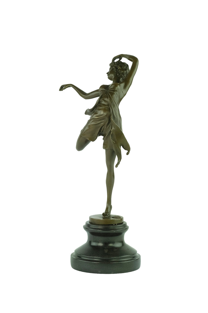 Bronze sculpture of a female dancer in a flowy dress