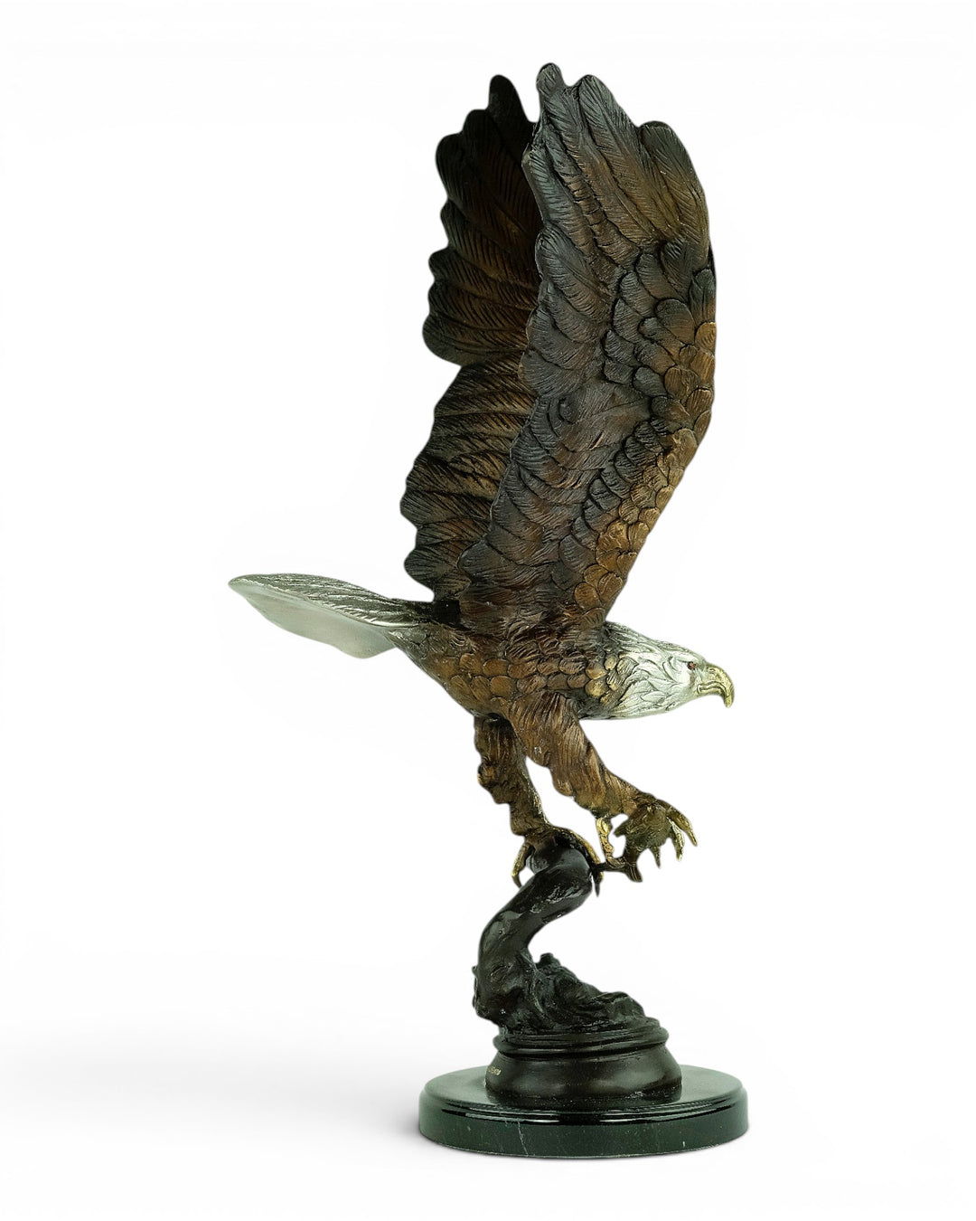 Bronze sculpture of a fishing eagle with wings spread