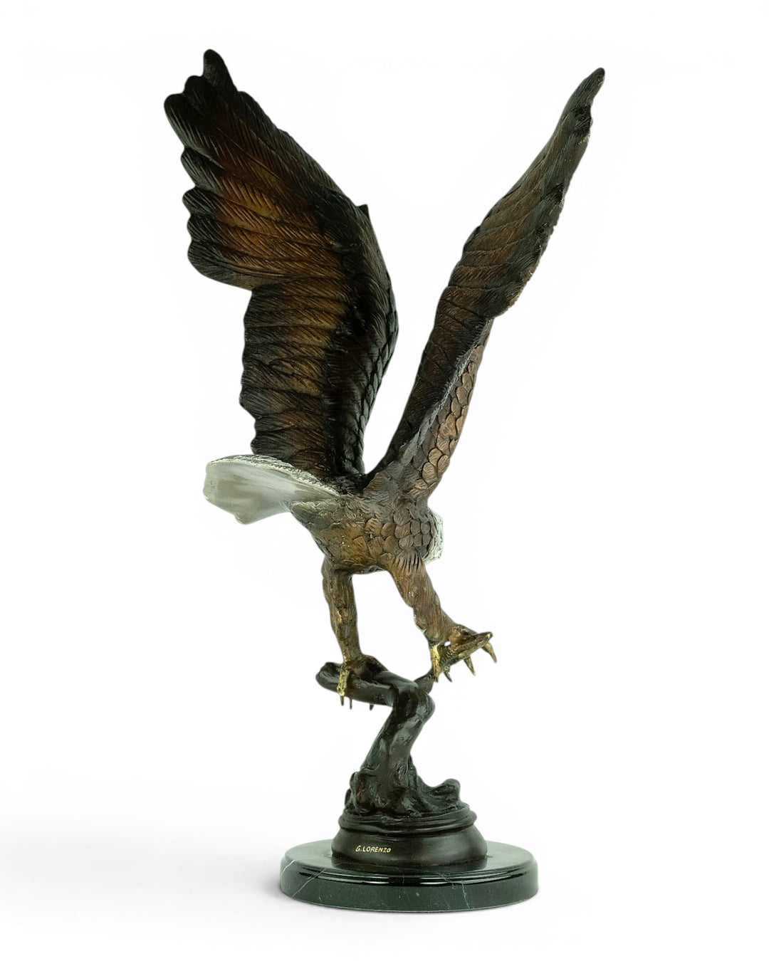 Bronze sculpture of a fishing eagle with wings spread