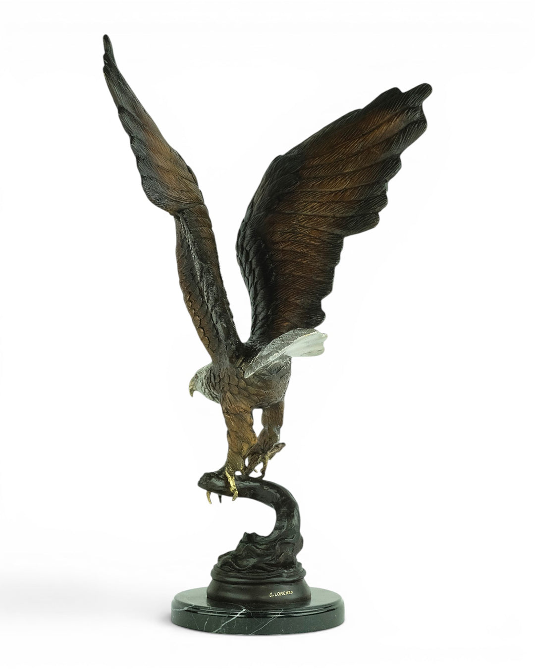 Bronze sculpture of a fishing eagle with wings spread