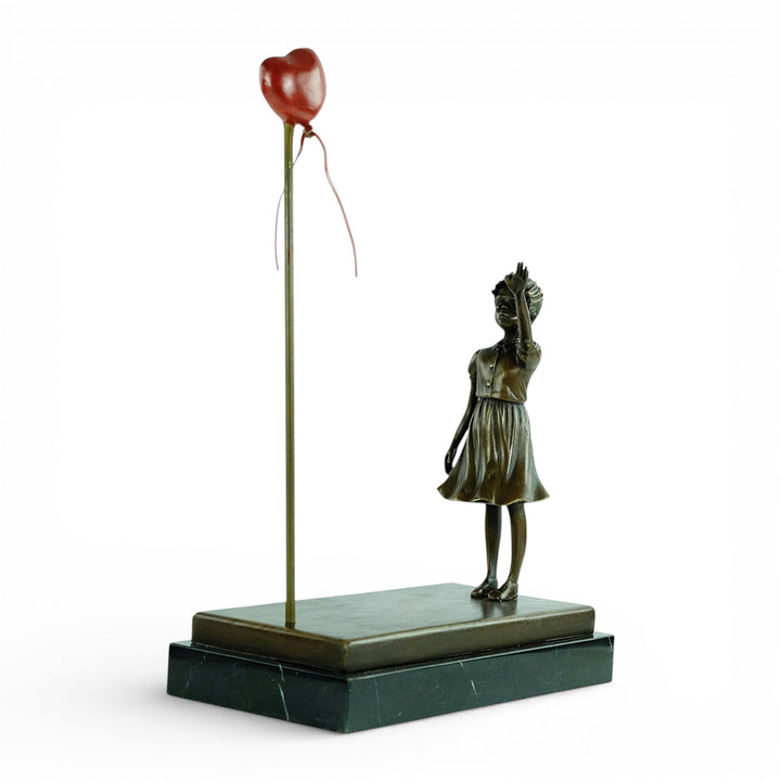 Bronze girl with balloon sculpture – inspired by Banksy