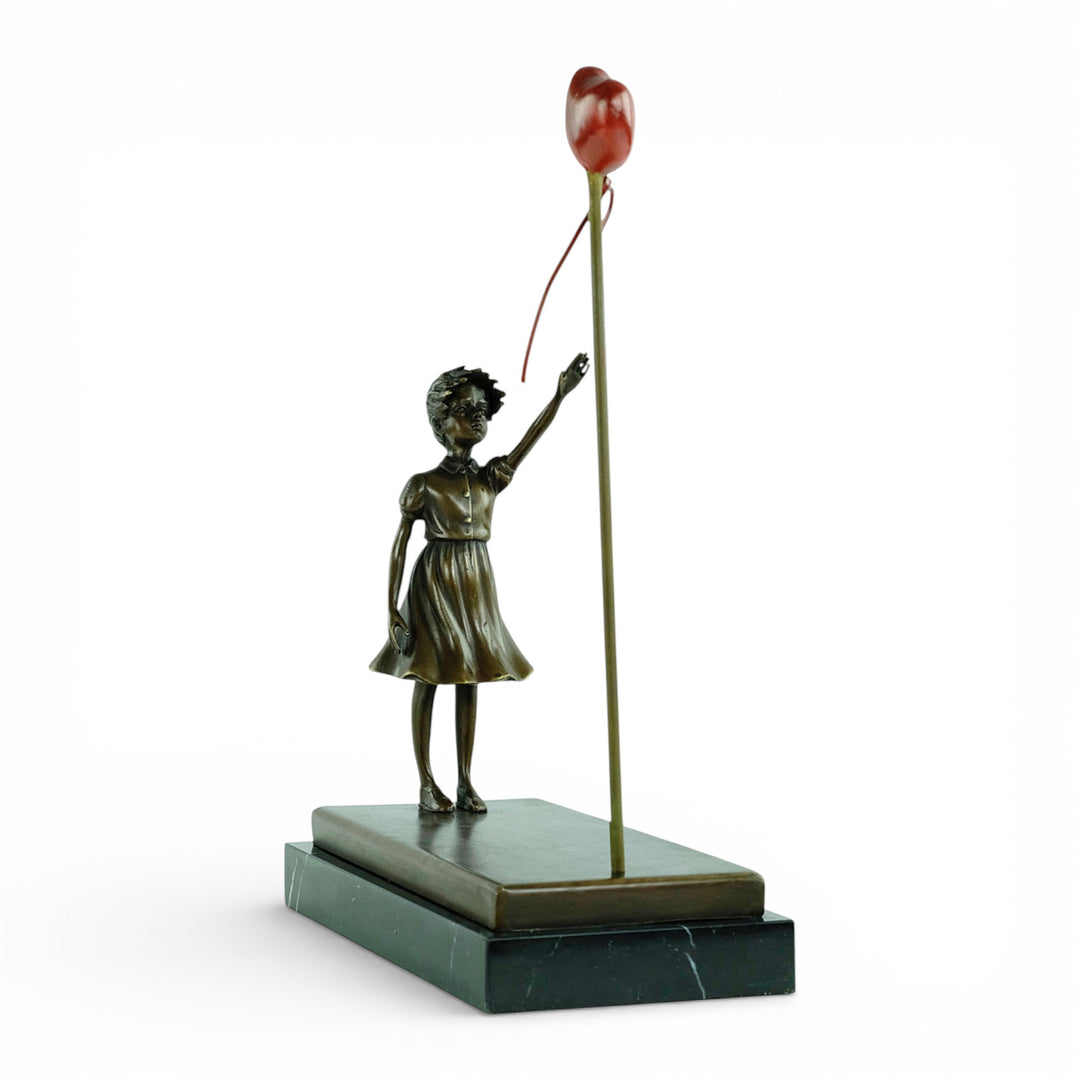Bronze girl with balloon sculpture – inspired by Banksy