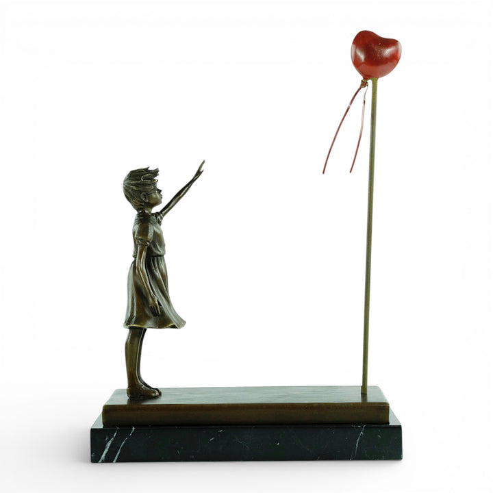 Bronze girl with balloon sculpture – inspired by Banksy