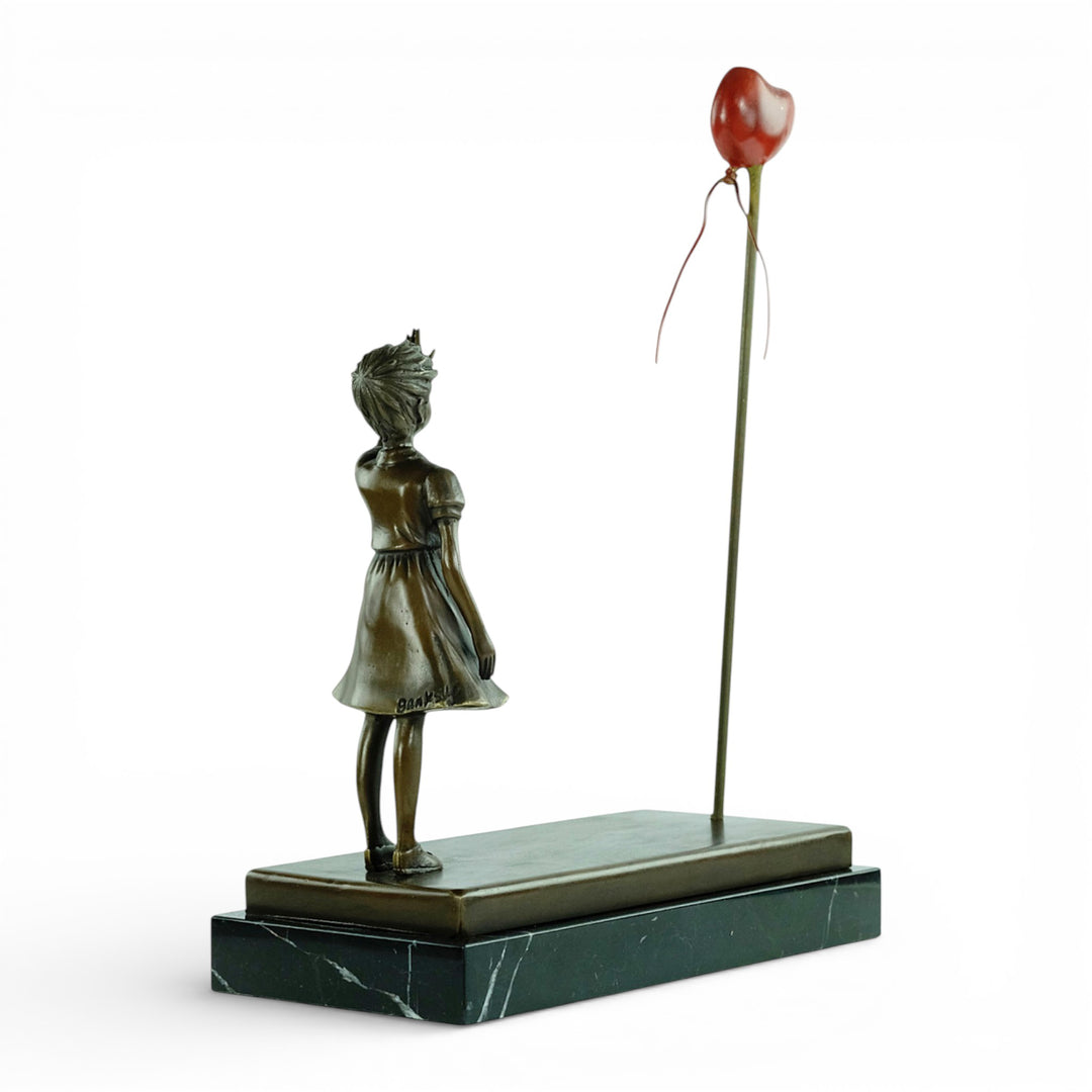 Bronze girl with balloon sculpture – inspired by Banksy