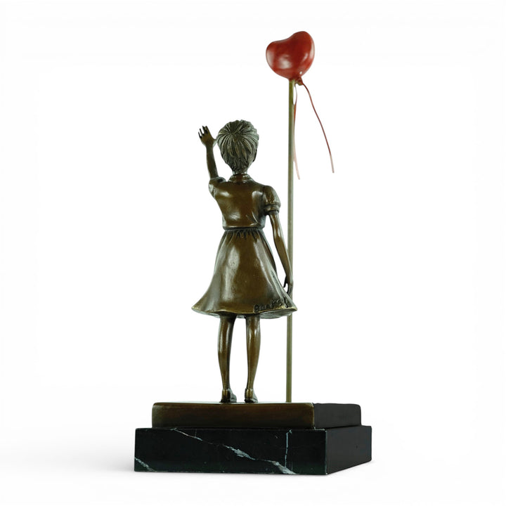 Bronze girl with balloon sculpture – inspired by Banksy