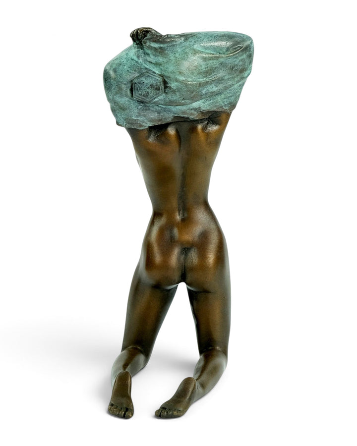 Bronze Sculpture of an Undressing Female Nude