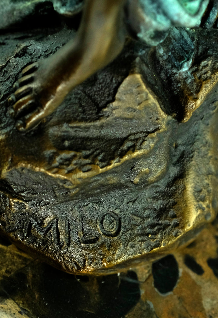 Modern bronze sculpture of dancing female nude with scarf