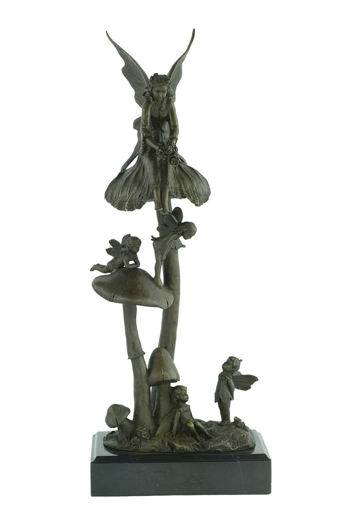 Bronze sculpture of a group of fairies sitting on mushrooms