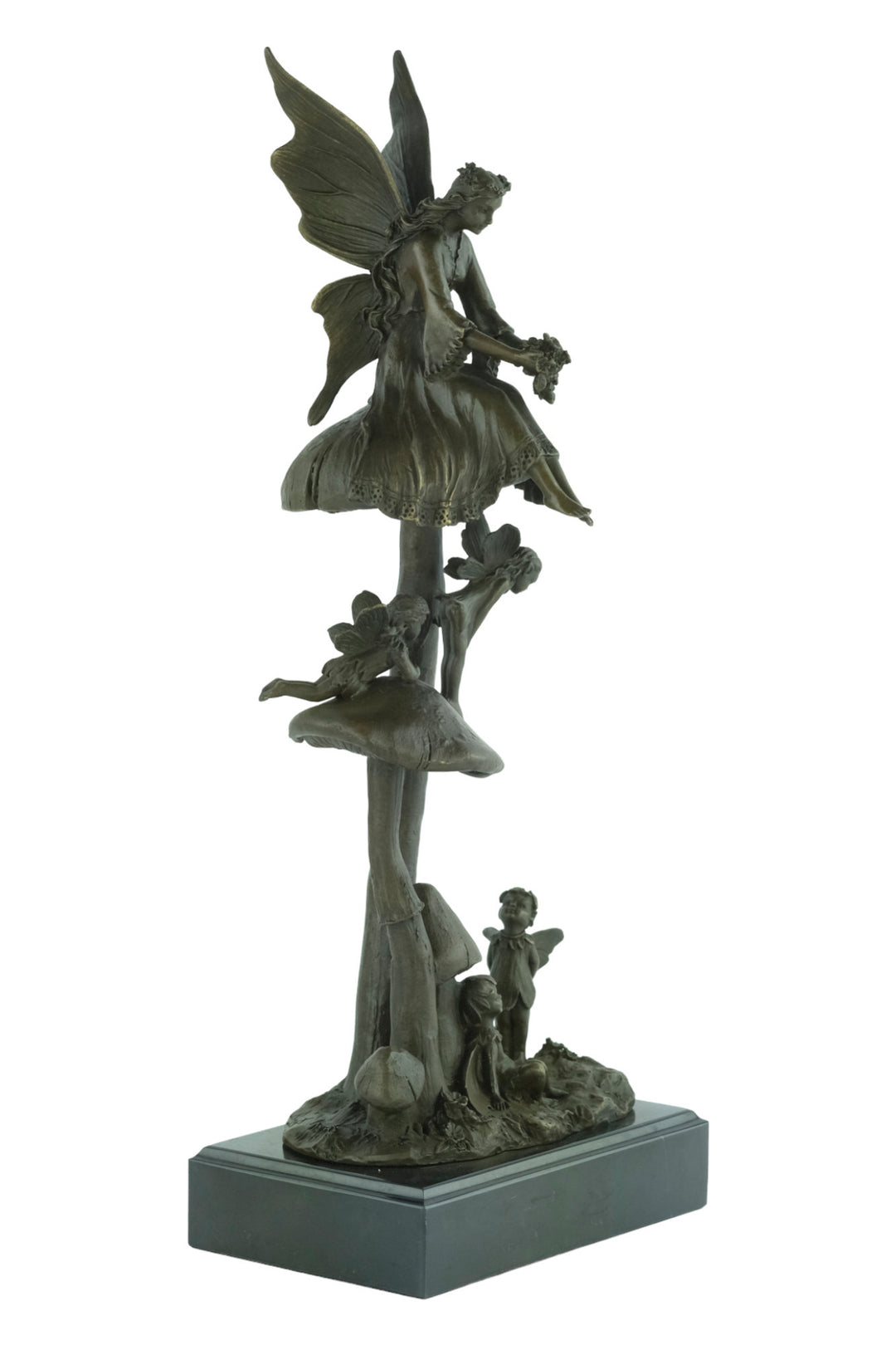 Bronze sculpture of a group of fairies sitting on mushrooms