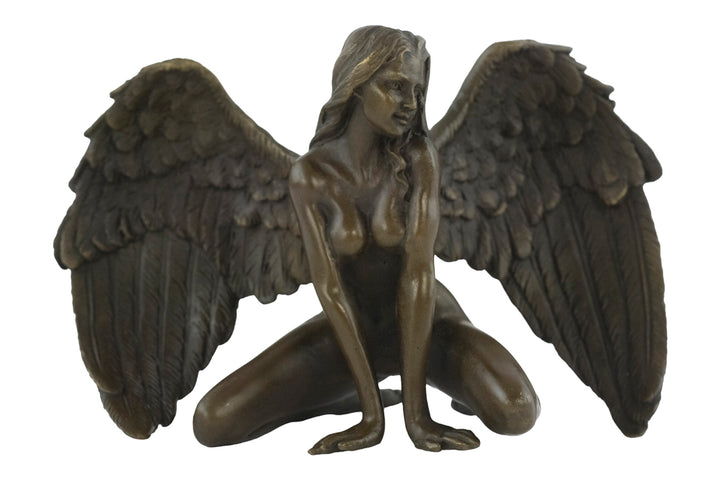 Bronze sculpture of a winged female nude leaning forward