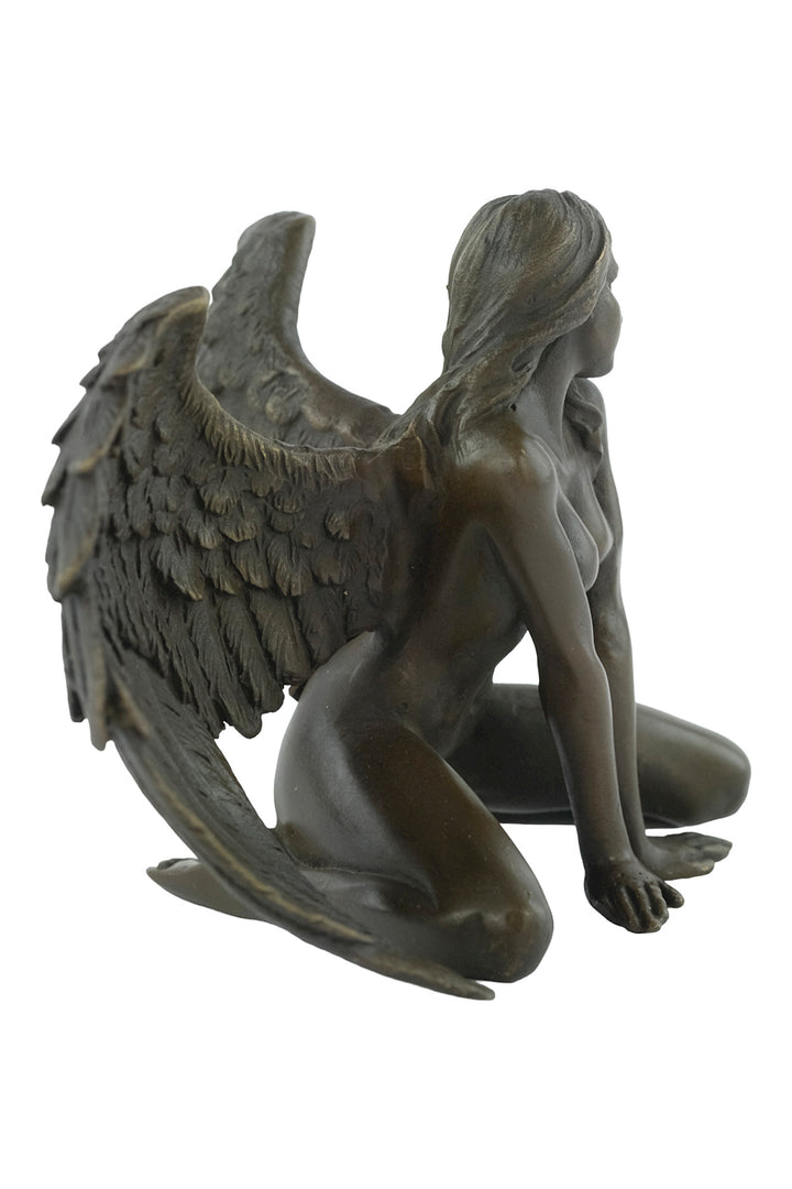 Bronze sculpture of a winged female nude leaning forward