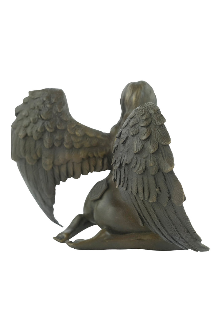 Bronze sculpture of a winged female nude leaning forward