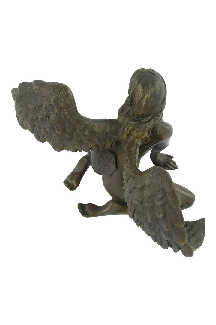 Bronze sculpture of a winged female nude leaning forward