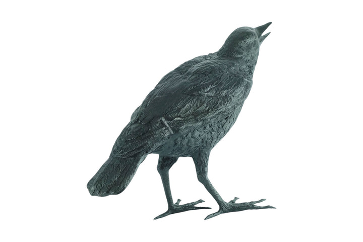 Lifesize bronze sculpture of a raven female