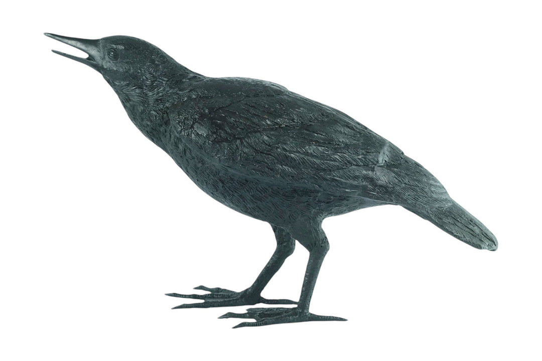 Lifesize bronze sculpture of a raven female