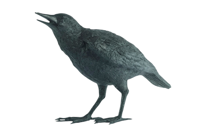 Lifesize bronze sculpture of a raven female