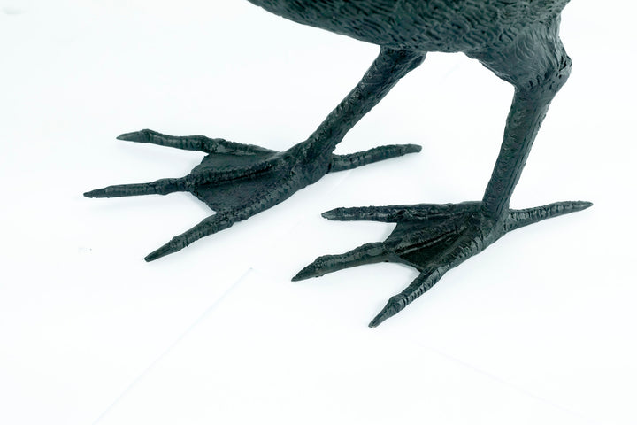Lifesize bronze sculpture of a raven female