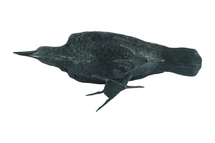 Lifesize bronze sculpture of a raven female