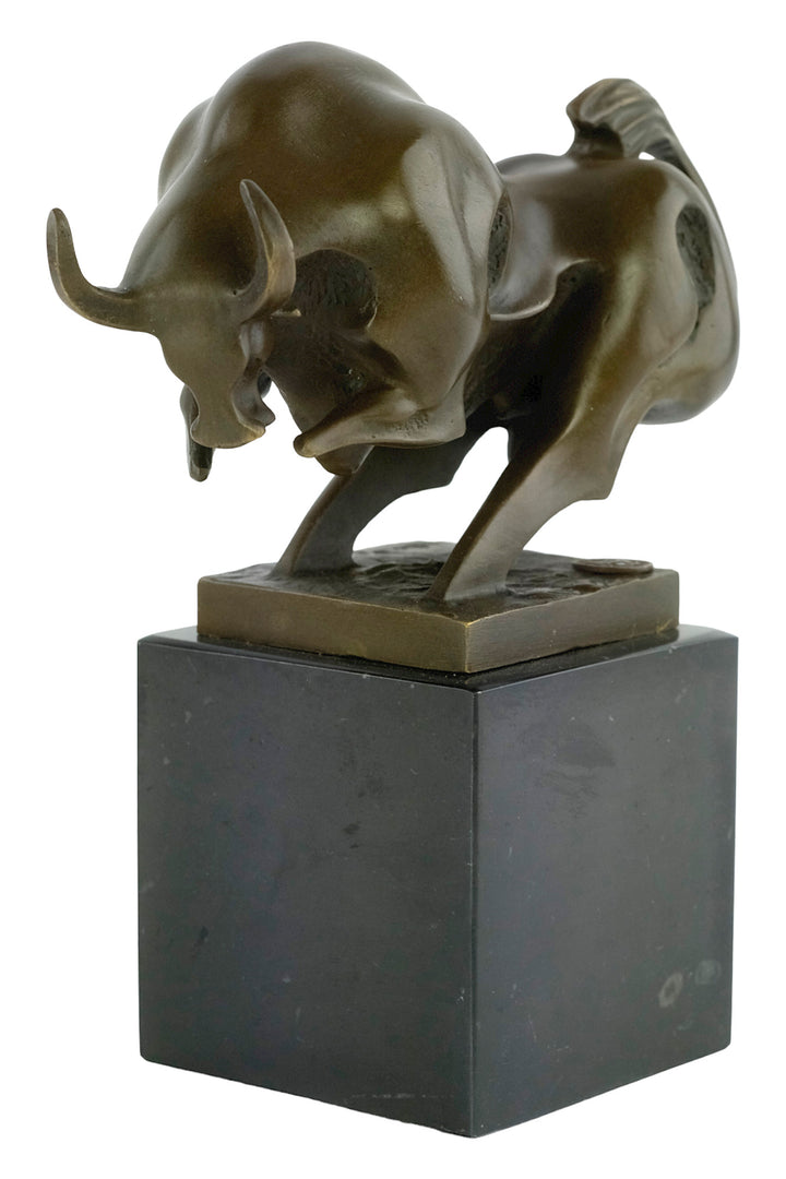 Modern bronze sculpture of a charging bull