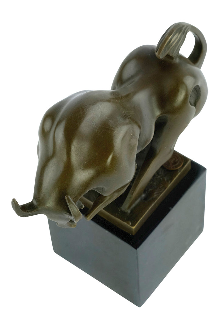 Modern bronze sculpture of a charging bull