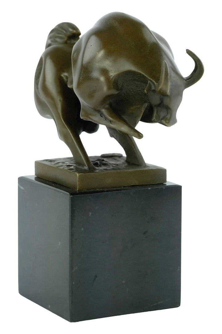 Modern bronze sculpture of a charging bull