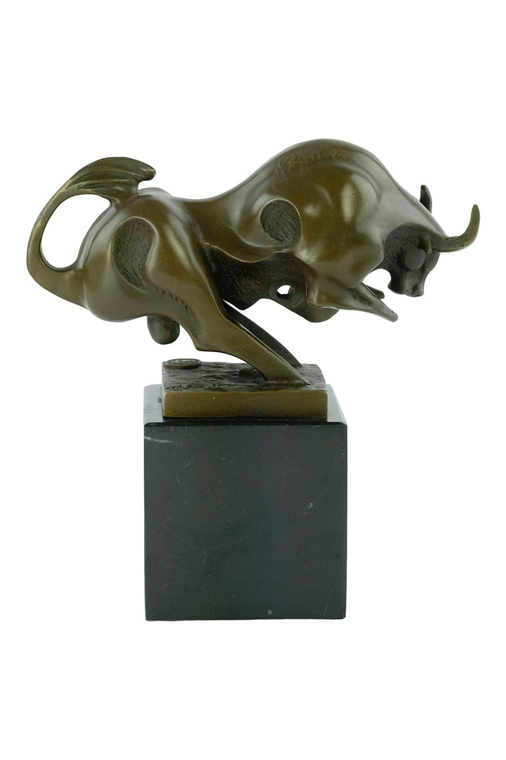Modern bronze sculpture of a charging bull
