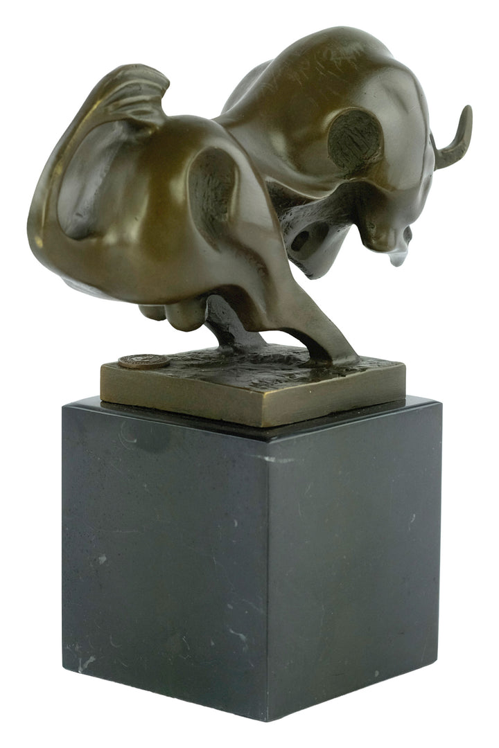 Modern bronze sculpture of a charging bull