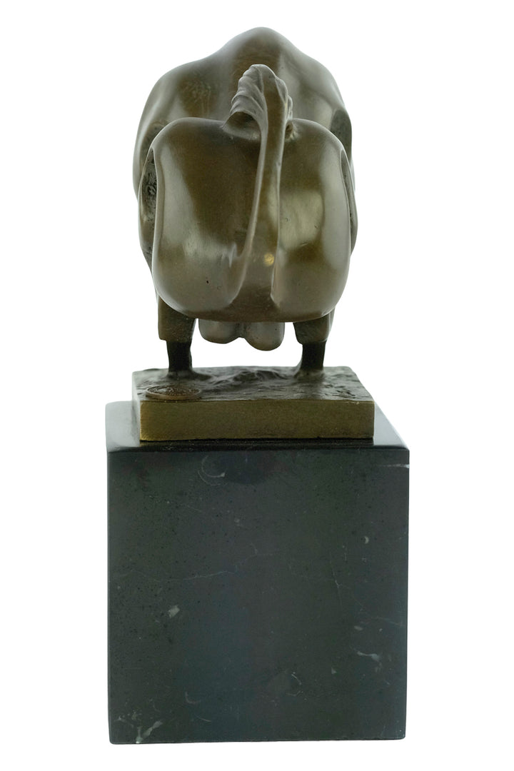 Modern bronze sculpture of a charging bull