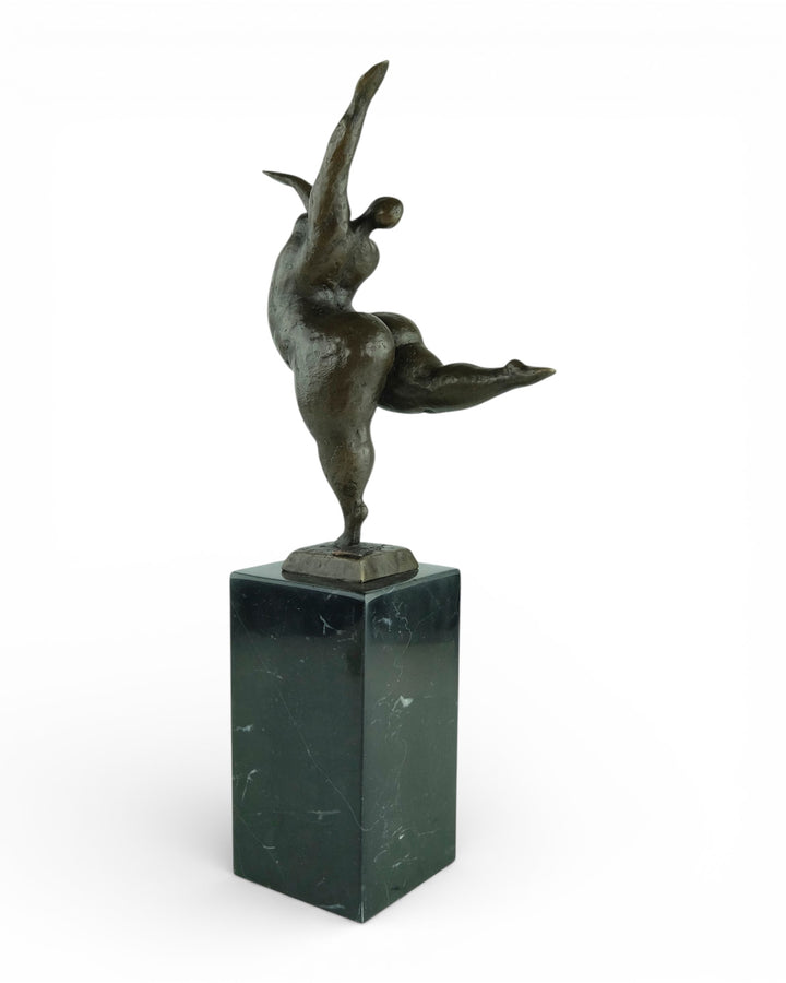 Bronze sculpture of a voluptuous female nude dancing freely