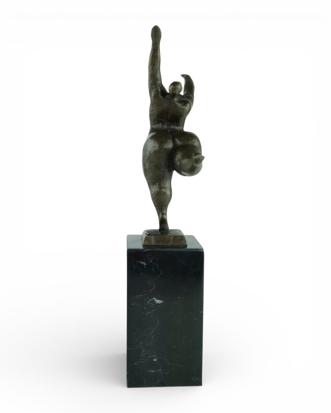 Bronze sculpture of a voluptuous female nude dancing freely