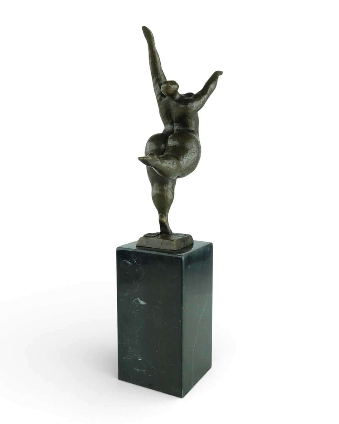 Bronze sculpture of a voluptuous female nude dancing freely