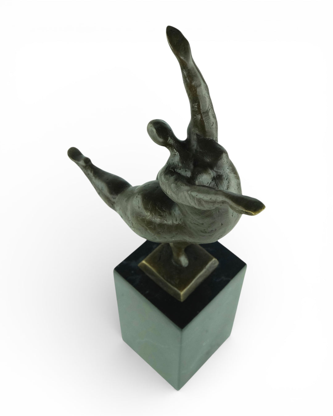 Bronze sculpture of a voluptuous female nude dancing freely